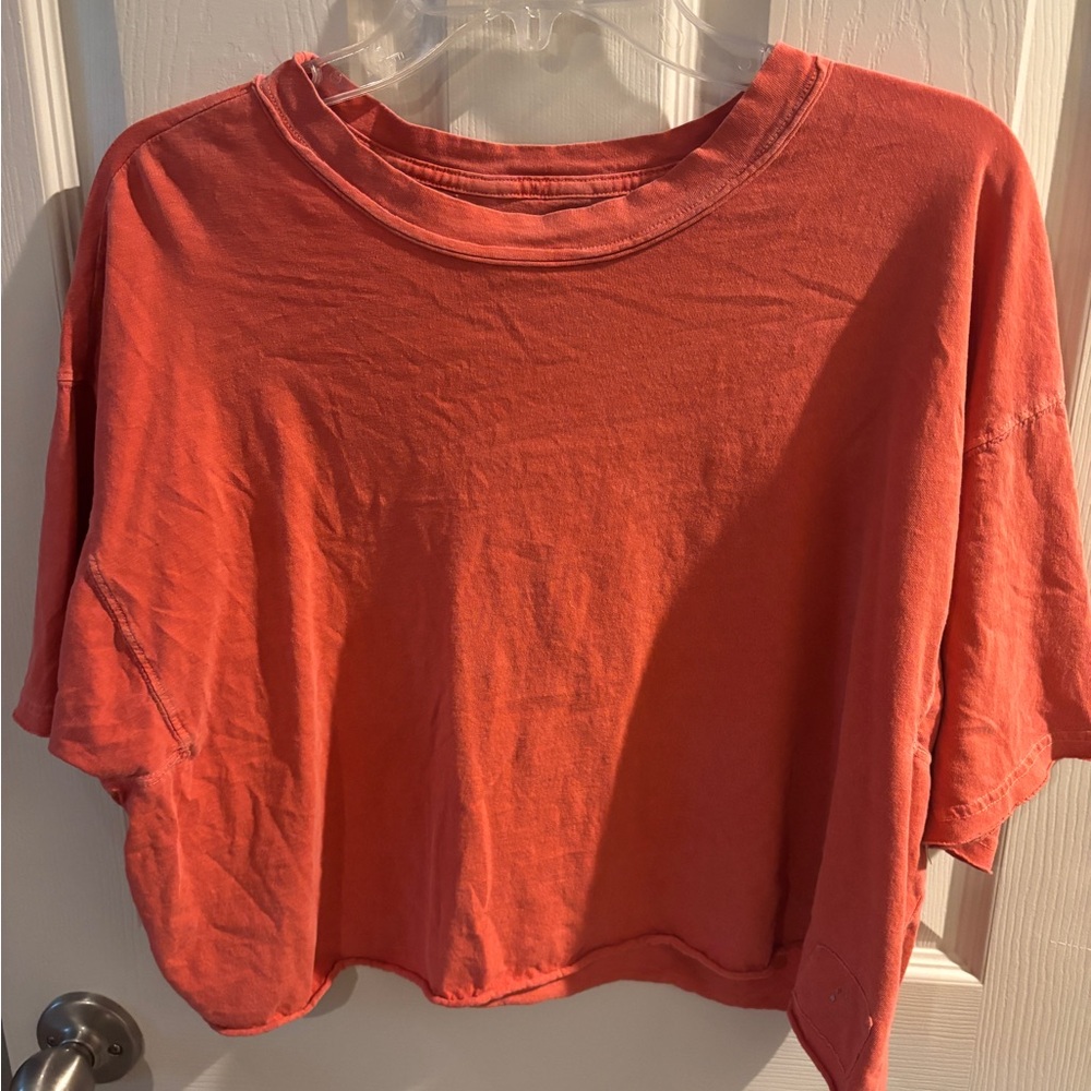 Free people orange flowy crop top size small